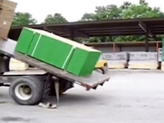 a pallet with 4 straps slides off a truck and both steel bands snap while the plastic straps remain